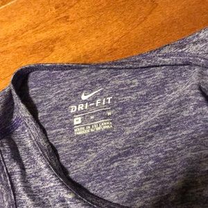 Purple Nike razor back tank top.